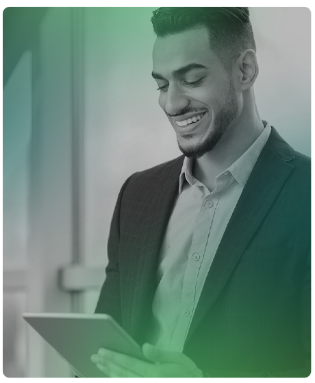 male smiling at smart device