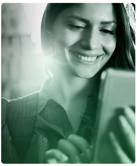 image of woman smiling at her smart device