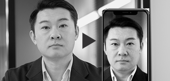 image of male with selfie on phone screen illustrating video injection