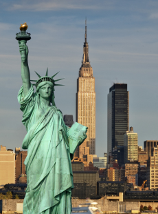 New York City Skyline featuring the Statue of Liberty and Empire State Building